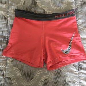 Pink nike pros (very stretchy and comfortable!)